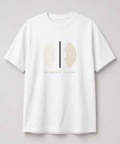 Between Tracks Vinyl Groove Unisex T-Shirt in white with cream-to-gold vinyl groove lines